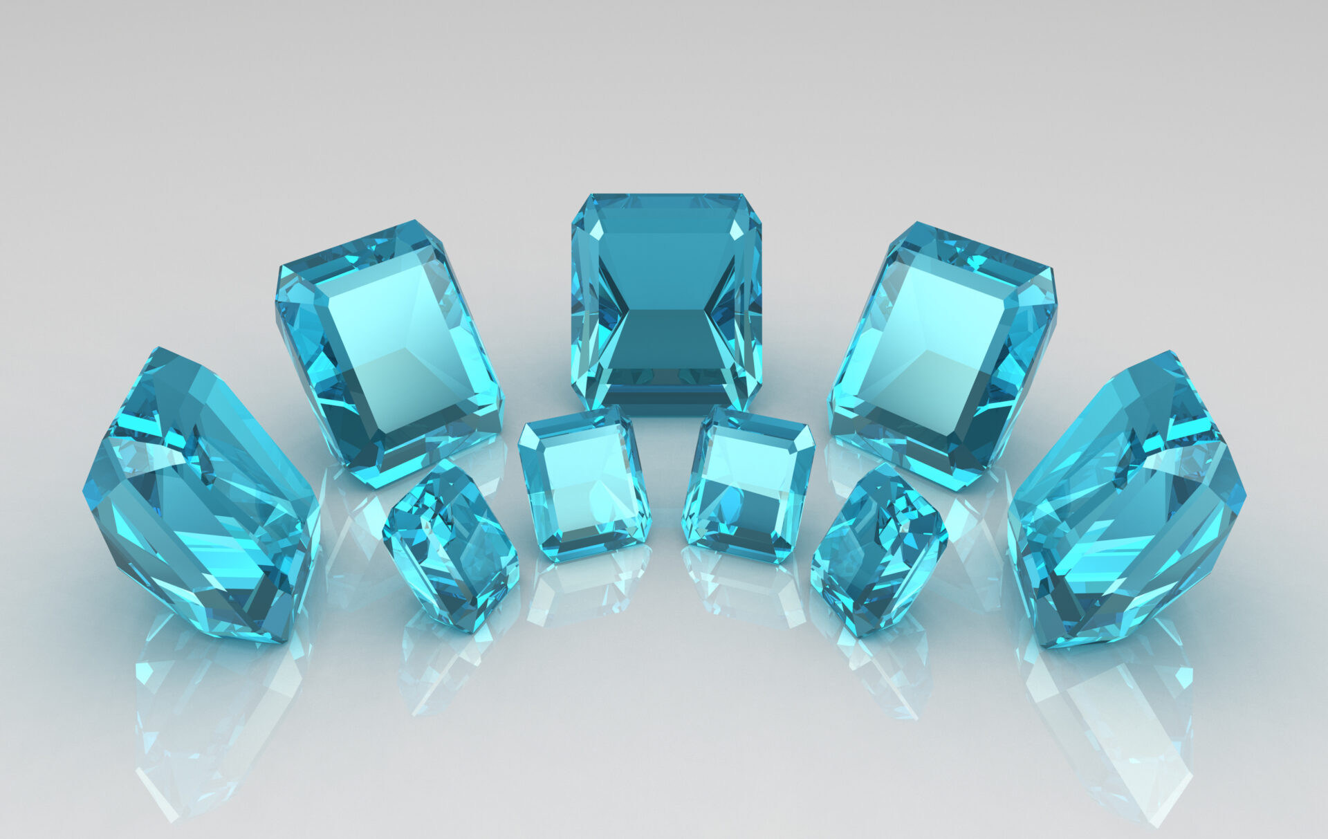 Collection of calibrated blue aquamarines in mixed cuts