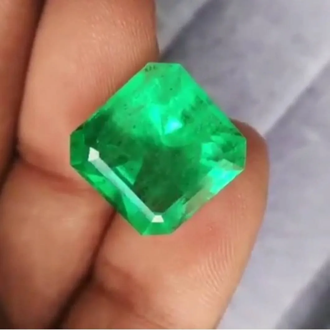 Asscher cut emerald used to discuss colored gemstone origin documentation